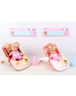 Lalka sikająca w nosidełku