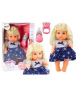 Lalka w granatowej sukience siusiająca butelka