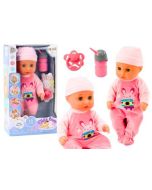 Lalka bobas w różowej piżamce siusiająca butelka